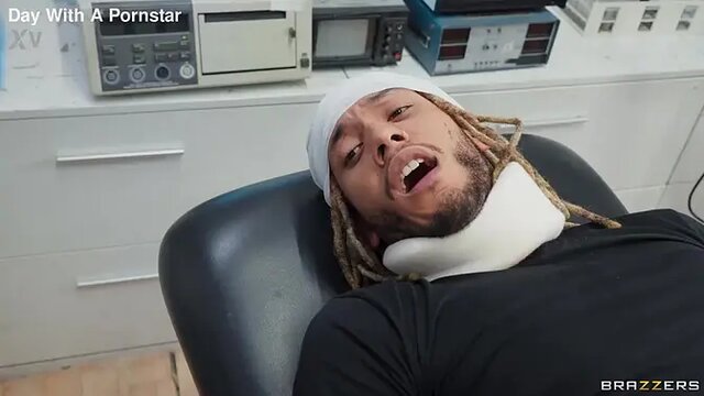 Tattooed Nurse Gags on large Cock and Takes Facial