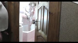 Naked woman sexy blonde in bathroom. Pervert man roommate in short T shirt without panties this watches outside, masturbate cock and cum. Cumshot. Old young. Wet pussy. Naked in public. Natural tits